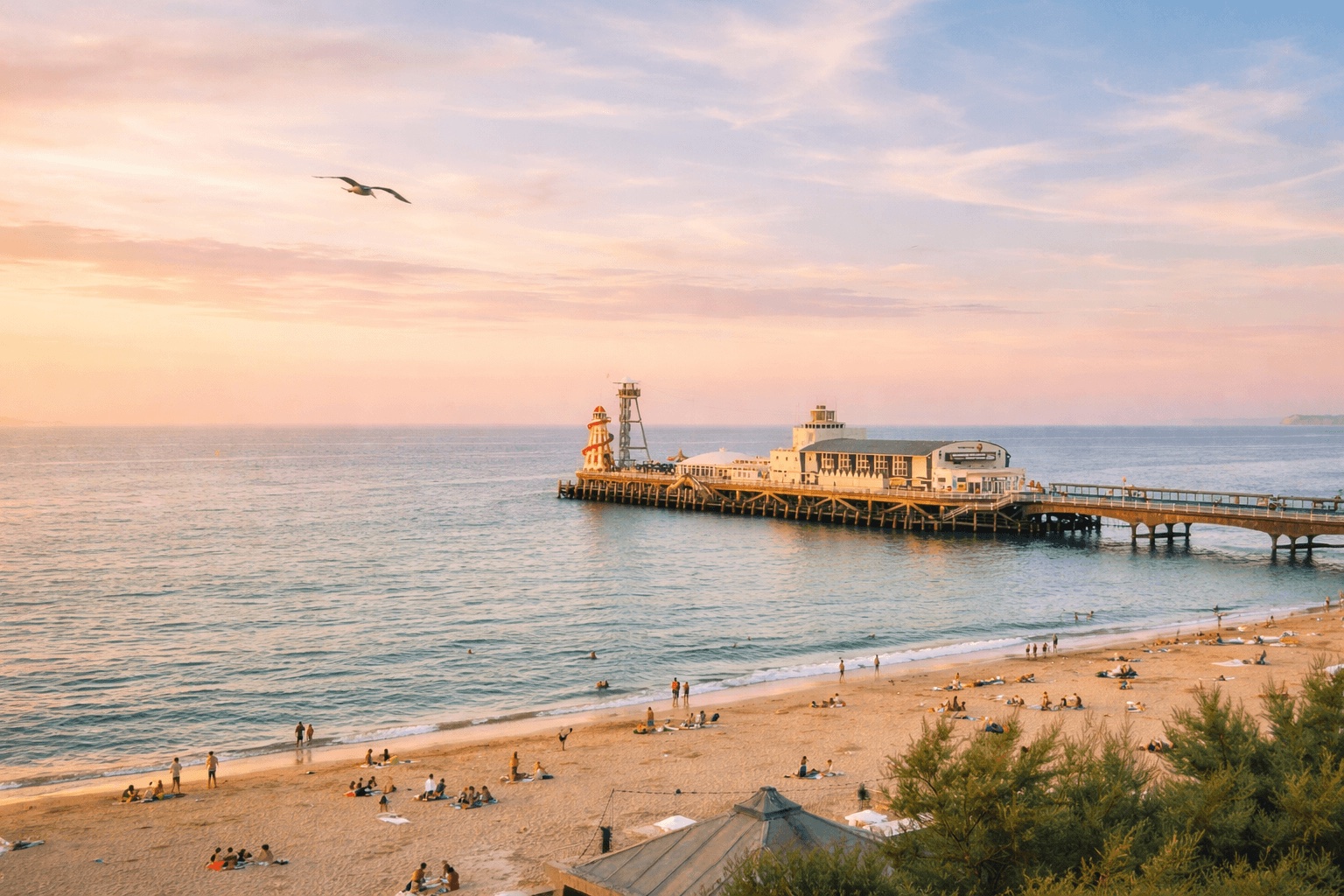 Bournemouth pier at sunset, seen from the beach